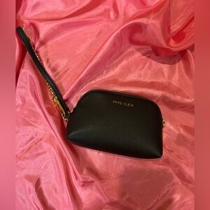 Anne Klein Black faux Leather Women's wristlet,golden zip with a beautiful chain